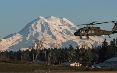 Joint Base Lewis-McChord (JBLM) Car Shipping Guide 2026: PCS Routes, Costs, and Veteran-Owned Service